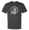 Image of dark gray t-shirt printed with a drawing of a plague doctor knitting a long scarf.